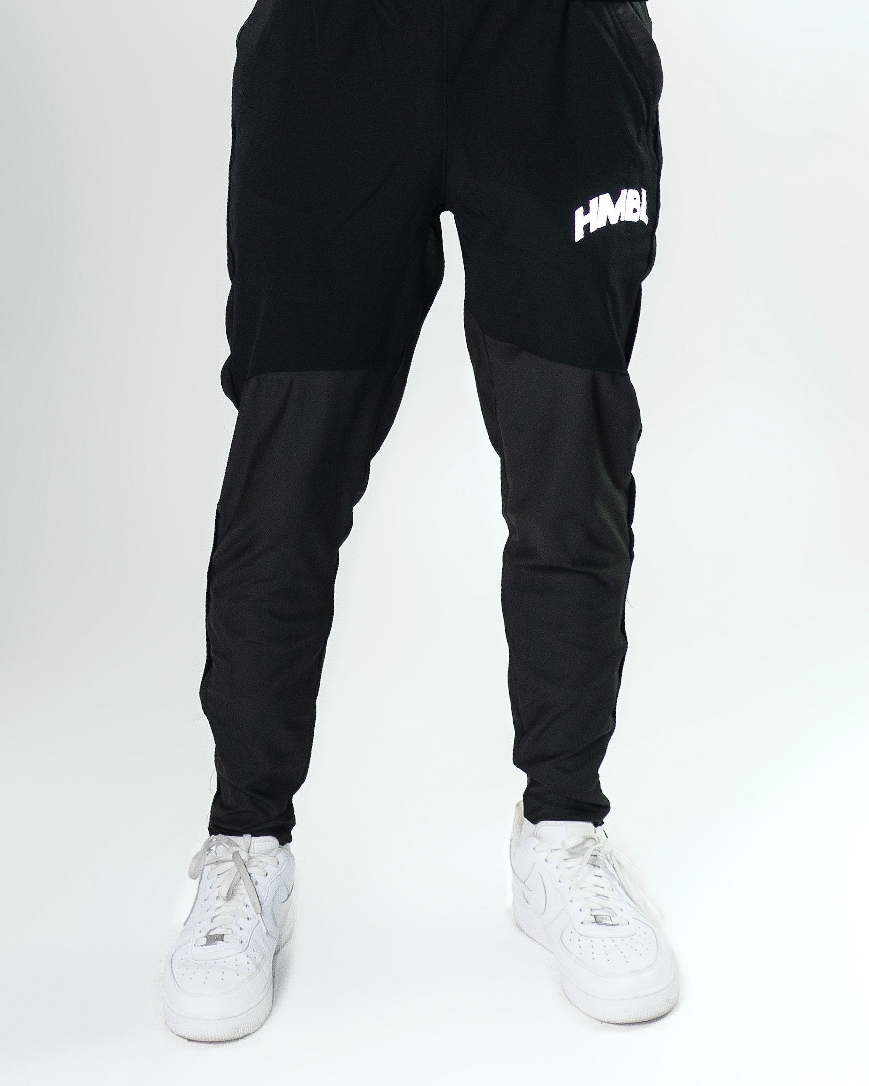 Black reflective track pants – HMBL